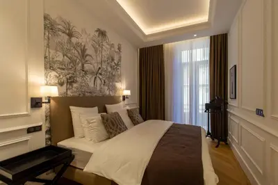 a bedroom with a large bed and a window at QUAI PROMENADE New Seafront Balcony Air Conditioning in Nice