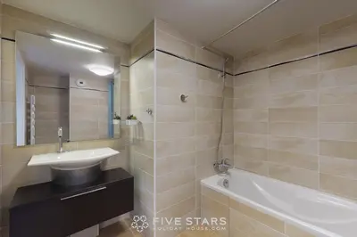 a bathroom with a sink and a bath tub at LUXURY BEACH five STARS HOLIDAY HOUSE in Nice