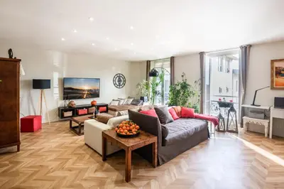 a living room with a couch and a table at 