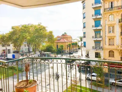 a view of a city street from a balcony at Résidence Les domes, Piscine in Nice