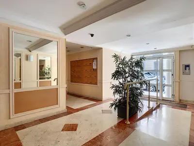 a hallway with a door and a potted plant at Nestor&Jeeves - BERLIOZ PATIO - Central - Residential area - Patio 20m in Nice