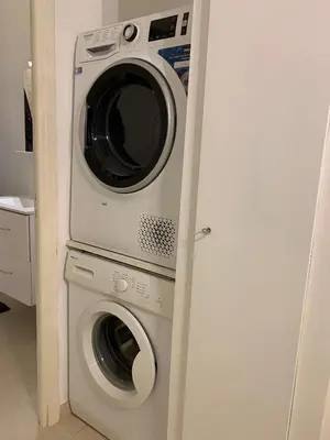 a washing machine and a dryer in a kitchen at Promenade des Anglais à côté du Negresco in Nice
