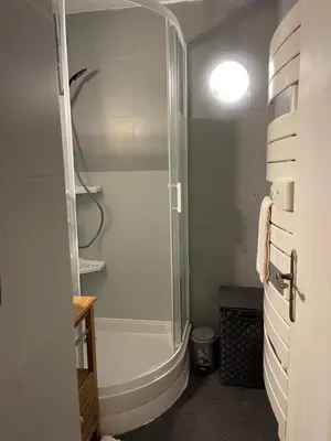 a bathroom with a shower with a glass shower stall at Appartement avec piscine privée in Cagnes-sur-Mer
