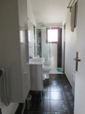 a bathroom with a sink and a shower at 2P entre mer et montagne in Gattières