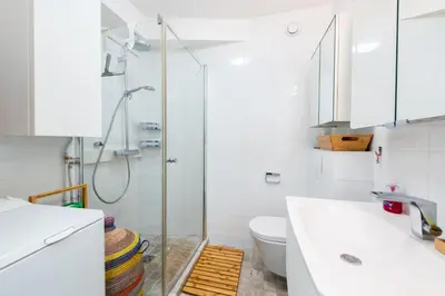 a bathroom with a shower and a toilet at La Providence in Nice
