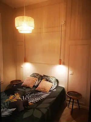 a bedroom with a bed with two pillows on it at A & K luxury appartments Port de Nice Garibaldi in Nice