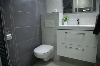 a bathroom with a toilet and a sink at Stylish Studio in only 50 meters from beach ! in Nice
