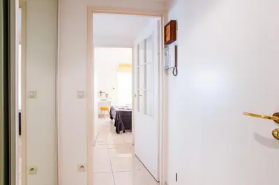 a hallway with a door leading into a room at PALAIS LIBERTE 4 AP4253 By Riviera Holiday Homes in Nice