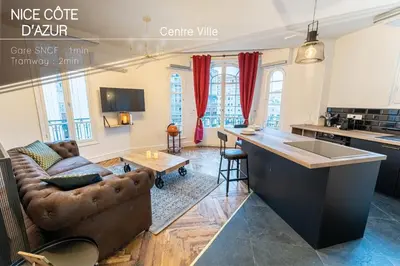 a living room with a couch and a table at Jacuzzi-Nice quartier des musiciens-Loft in Nice