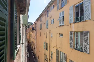 a view of an alley between two buildings at FEEL HOME - BARILLERIE in Nice