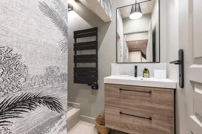 a bathroom with a sink and a mirror at Charming 2 Bdr Old Town in Nice