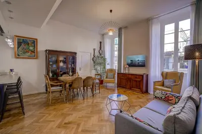 a living room with a couch and a table at Maison Bianchi - Old Town Flower market in Nice