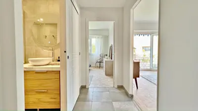 a bathroom with a sink and a mirror at LA LANTERNE in Nice