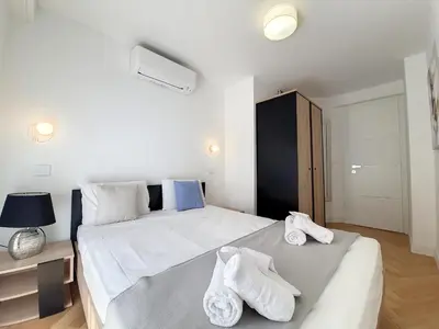 a bedroom with two beds with towels on them at Nestor&Jeeves - FLOREAL BEACH - Central - Close sea in Nice