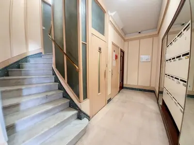 a hallway of a hospital with stairs and a door at Nestor&Jeeves - FLOREAL BEACH - Central - Close sea in Nice