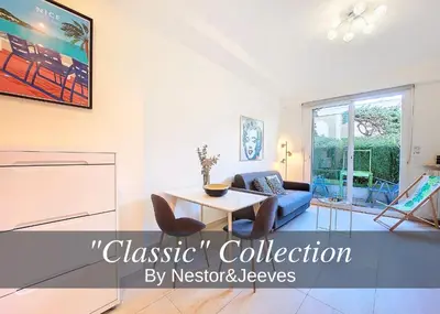 a living room with a table and chairs at Nestor&Jeeves - MARYLIN - Central - Very close sea in Nice