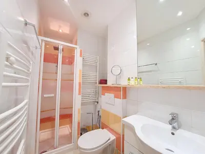 a white bathroom with a toilet and a sink at Nestor&Jeeves - MARYLIN - Central - Very close sea in Nice
