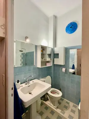 a bathroom with a sink and a toilet at Seaside vintage studio in Nice