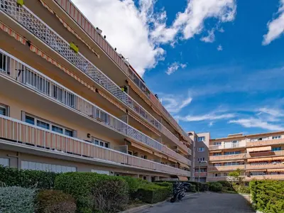 an apartment building with balconies on the side of it at Apartment Le Giono by Interhome in Saint-Laurent-du-Var