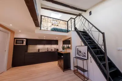 a kitchen and a staircase in a house at 06A2 - Heart of Old Nice beautiful renovated apartment in Nice