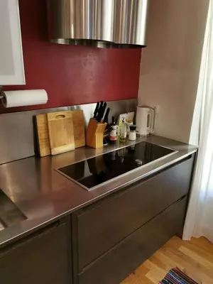 a kitchen with a sink and a counter top at Our home, Cozy Apartment two minutes from the sea - Clima in Nice