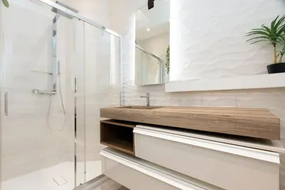 a bathroom with a sink and a shower at Maison Bianchi - Victor Hugo in Nice