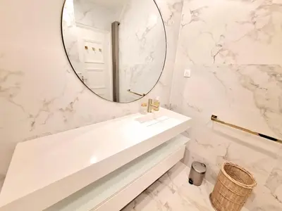 a bathroom with a sink and a mirror at Le Metropole Nice Victor Hugo in Nice
