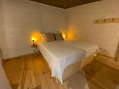 a bedroom with a bed with two lamps on it at Little California - Adorable Studio Indépendant in Cagnes-sur-Mer