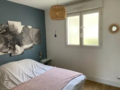 a bedroom with a bed and a window at Nice Absea Fabron 1 in Nice