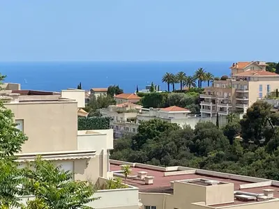 a view of a city with buildings and the ocean at Nice Absea Fabron 1 in Nice
