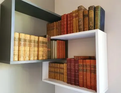 a book shelf filled with lots of books at SoNiceRiviera in Nice