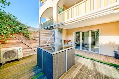 an open deck with a staircase in a house at Charmant studio in Cagnes-sur-Mer