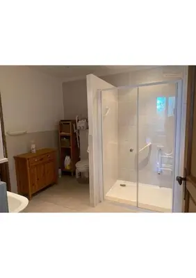 a bathroom with a toilet and a glass shower at Maison le Rêve in Falicon