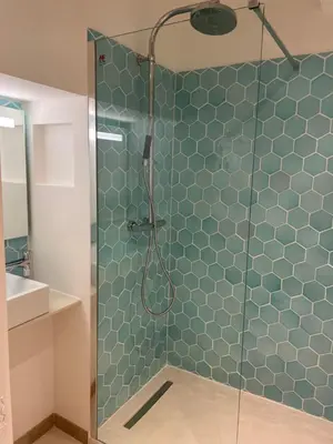 a bathroom with a shower with a glass door at Summerhouse 2 bed quiet Old Nice balcony100m beach in Nice