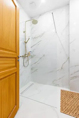 a shower with a glass door in a bathroom at PROMENADE SEA VIEW - Terrasse vue mer in Nice