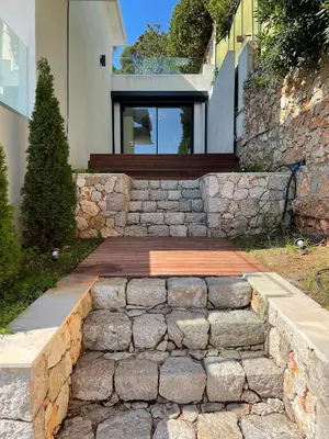 a stone stairway leading to a house at Villa LA ALEGRIA in Nice