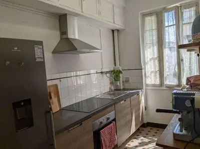 a kitchen with a sink and a stove top oven at Amazing 2-bedroom apartment in Nice near the beach in Nice