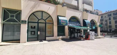 an empty street in front of a building at Lovely 1 bedroom vacation home with free parking. in Nice