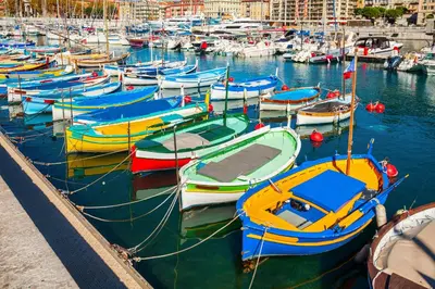 a bunch of boats are docked in a harbor at LE 323 PROM - BEACHFRONT - PARKING - NEAR TRAM &SUPERMARKET - AC - washing machine in Nice