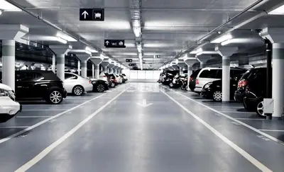 a parking garage filled with lots of parked cars at Nice - Paillon apartment by Stay in the heart of ... in Nice