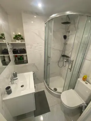 a bathroom with a shower and a toilet and a sink at Studio sur avenue jean médecin à Nice in Nice