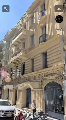 a group of motorcycles parked in front of a building at Nice, Seaside apartment in Nice