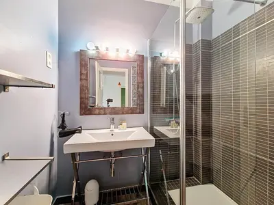 a bathroom with a sink and a shower at Nestor&Jeeves - SOLAR - By sea - Balcony in Nice