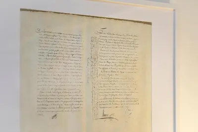 a page of a book with handwriting on it at La plume de Paul in Nice