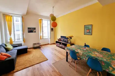 a living room with a table and a couch at 