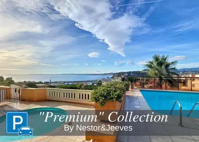 a view from the balcony of a house with a swimming pool at Nestor&Jeeves - GRAND SUD TERRASSE - Pool - Free parking in Nice