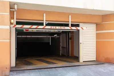 a garage entrance to a parking garage at #4 Papon Parking climatisé terrasse & wifi 5mins à pieds du Vieux Nice in Nice