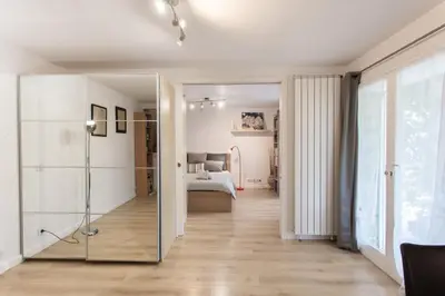 a room with a glass door leading to a bedroom at Beautiful villa with panoramic view over Nice in Nice