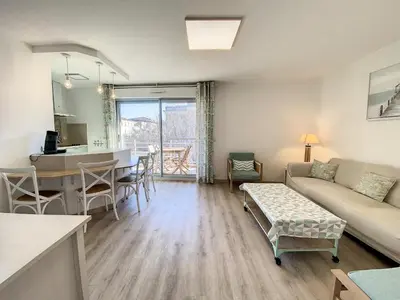a living room with a couch and a table at A303- Appartement 3 pieces 4 personnes- Le Crystal in Cagnes-sur-Mer