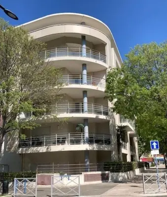 an apartment building with balconies on the side of it at A303- Appartement 3 pieces 4 personnes- Le Crystal in Cagnes-sur-Mer